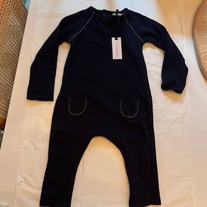 NWT black onesie from 1+ in the Family 18 months